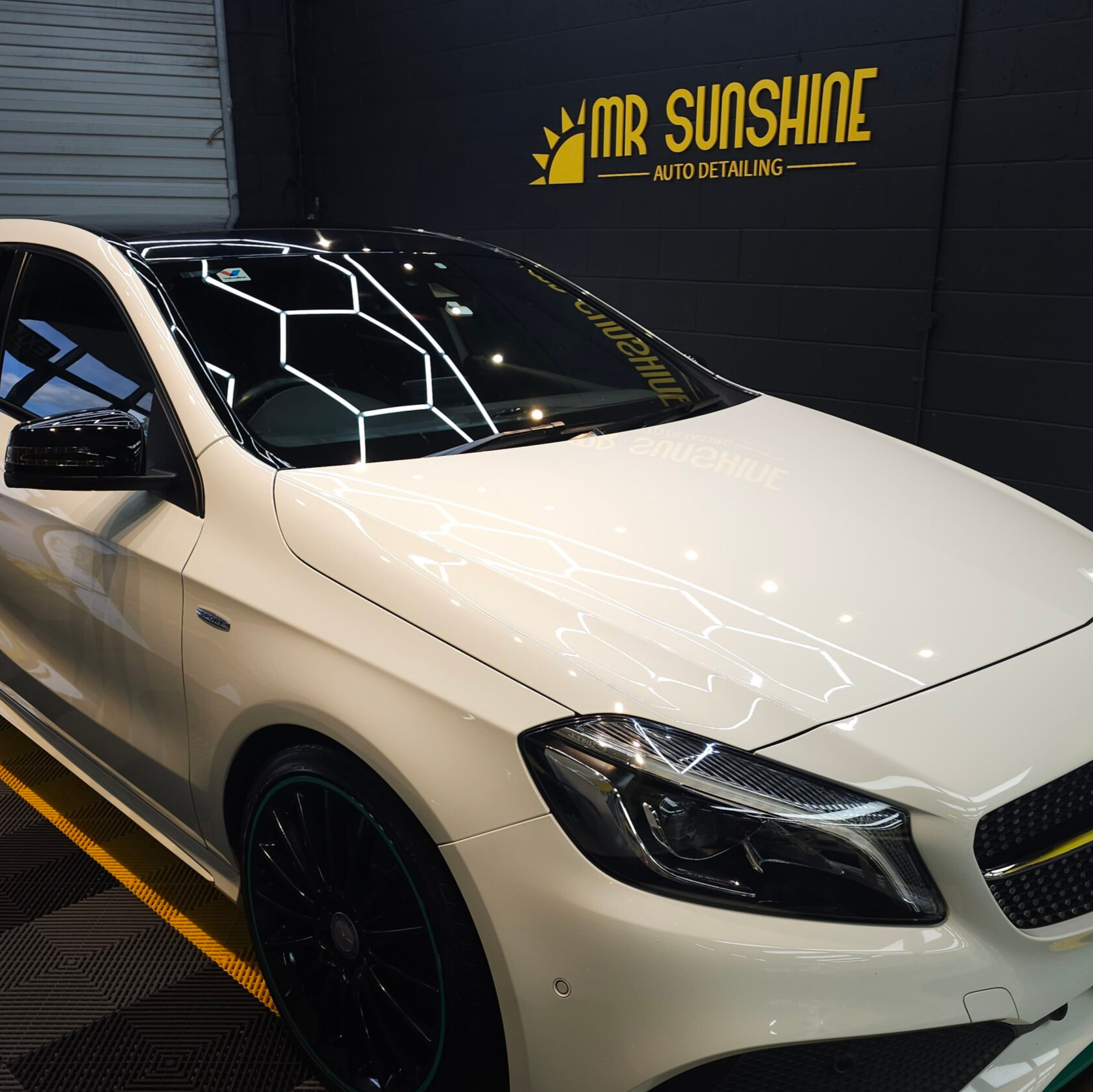 White Mercedes hatchback | Featured image for the Car Overspray Removal page.