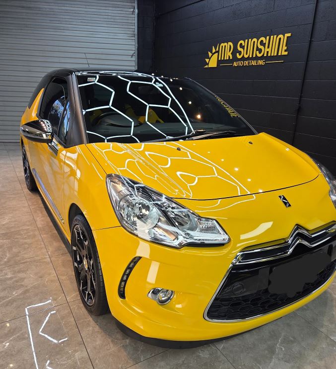 Yellow hatchback| Featured image for the Car Overspray Removal page.