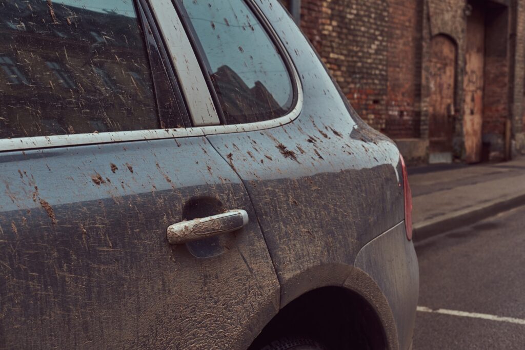 A car covered in mud | Image for the Car Detailing for Environmental Damage page.